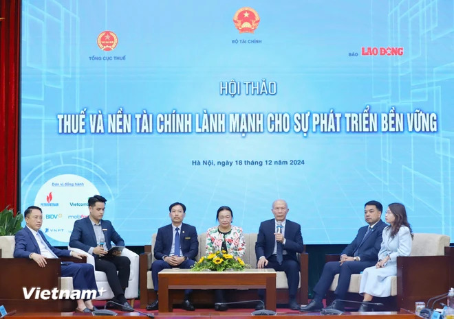 Hội thảo là dịp để các diễn giả chia sẻ đánh giá, kiến nghị về chính sách thuế. (Ảnh: Vietnam+)